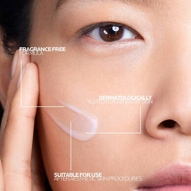 Woman applying Cicaplast Vitamin B5 Serum to skin