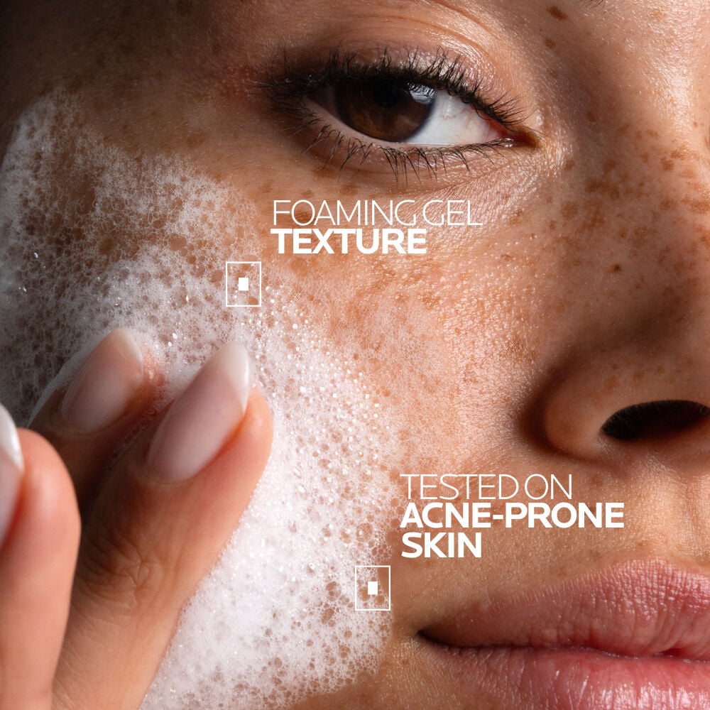 Woman applying Effaclar + M Purifying Foaming Gel Cleanser onto wet skin